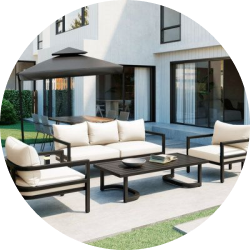 Modern outdoor patio with black metal furniture, white cushions, and a large umbrella