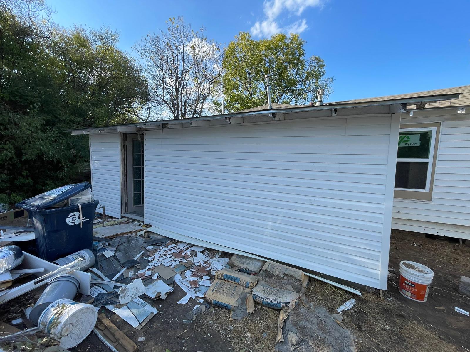 Casabianca Remodeling performing Texas home remodeling services with new siding installation on a residential property